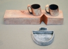 Two Small Red Mugs on Long Notched Base, Small-Scoop.